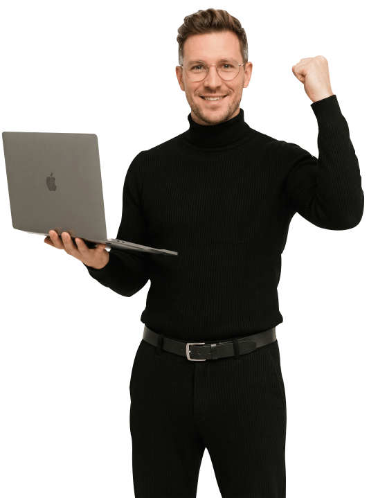 Mann mit Laptop in der Hand